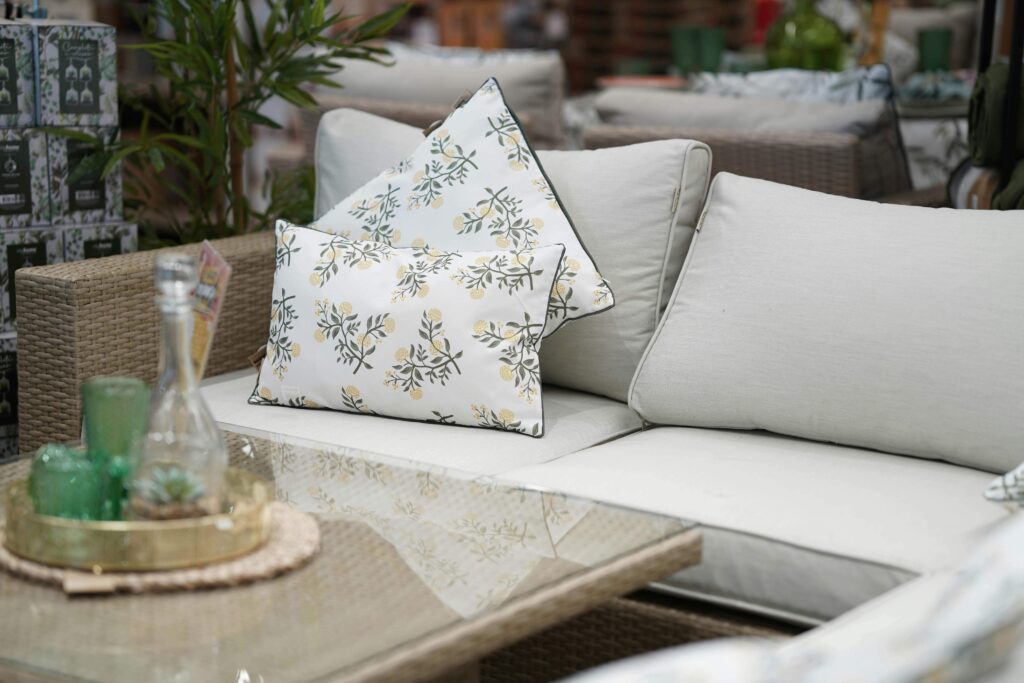 Outdoor rug and cushions creating a cosy backyard seating area