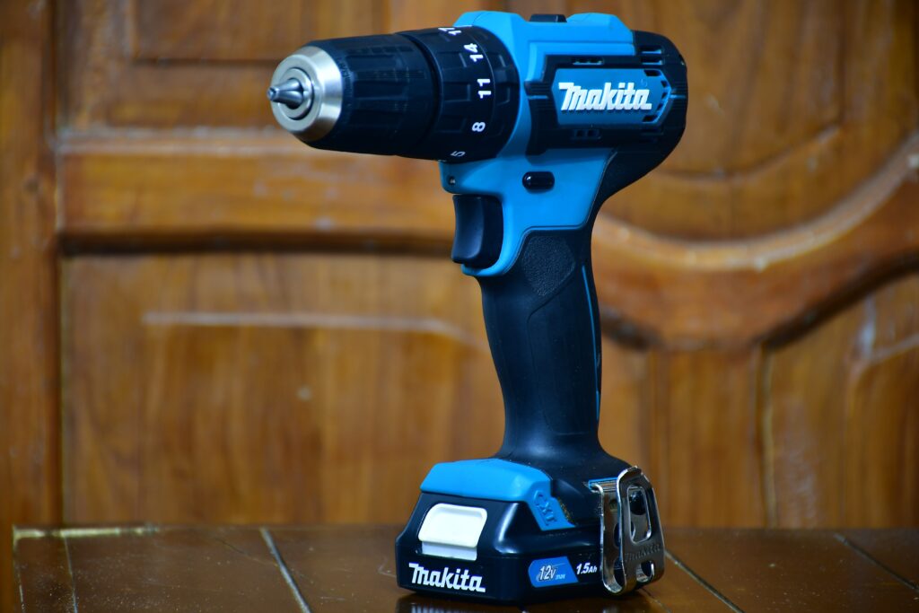 a cordless drill to fix a wall fixture