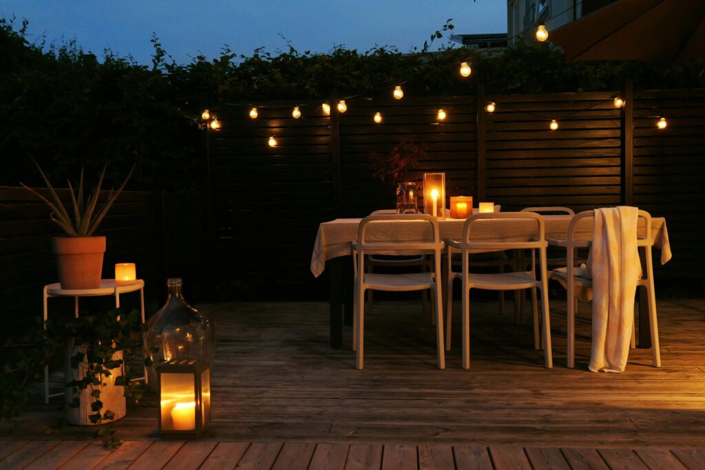 Refresh your backyard for autumn with cosy outdoor seating and warm string lights